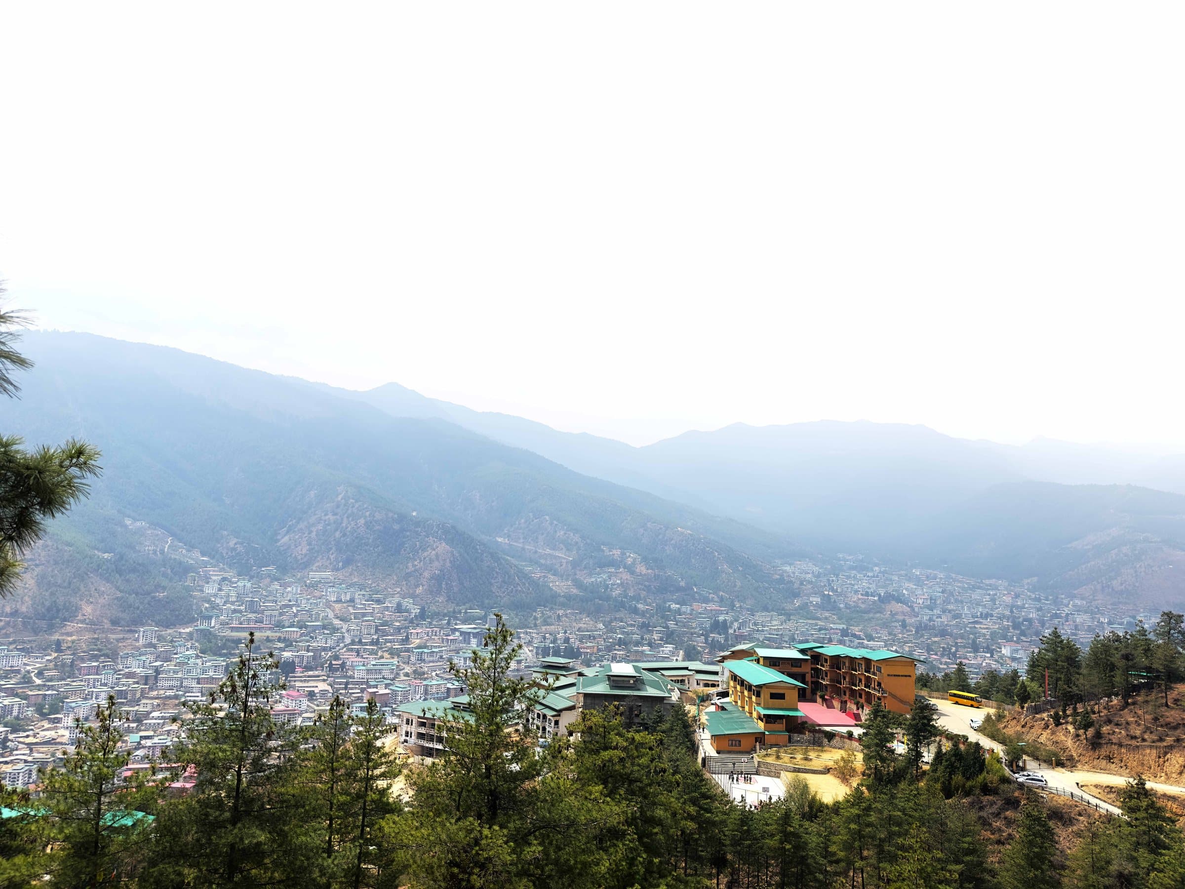 The ELC campus above Thimphu, with the valley and Himalayan foothills beyond